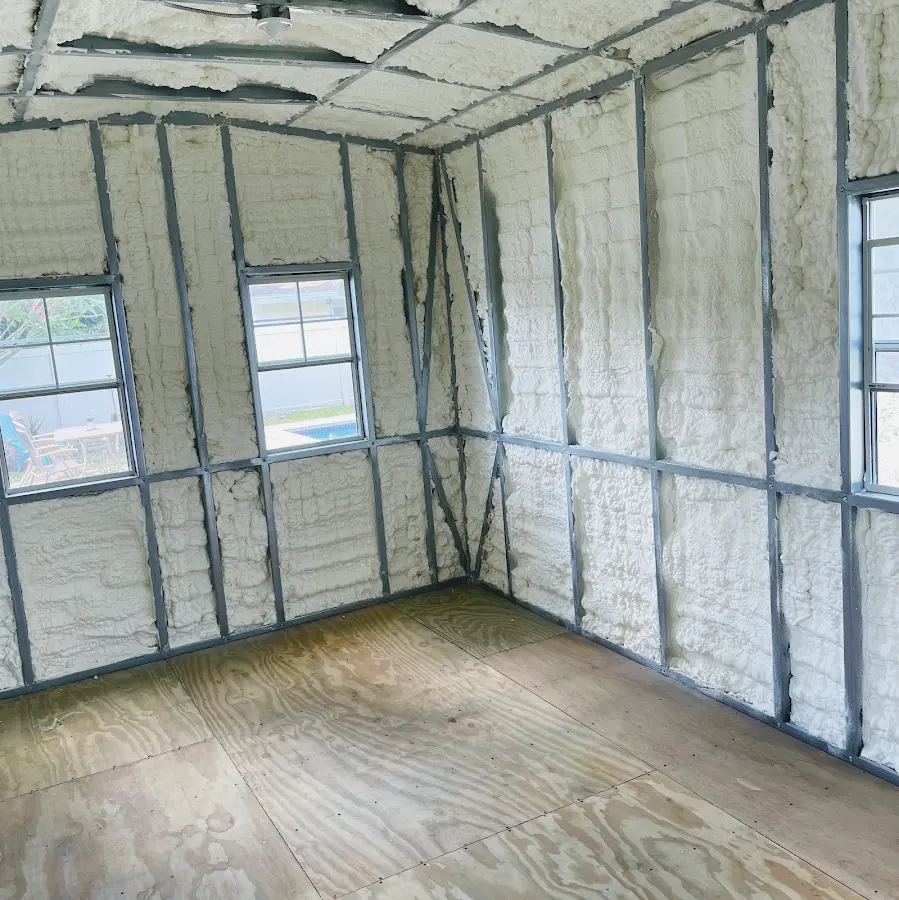 Closed-cell spray foam insulation applied to wall cavities in a residential project in Pleasant Run